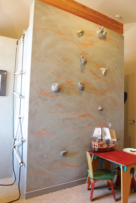 
Son Will enjoys this climbing wall in his bedroom.

